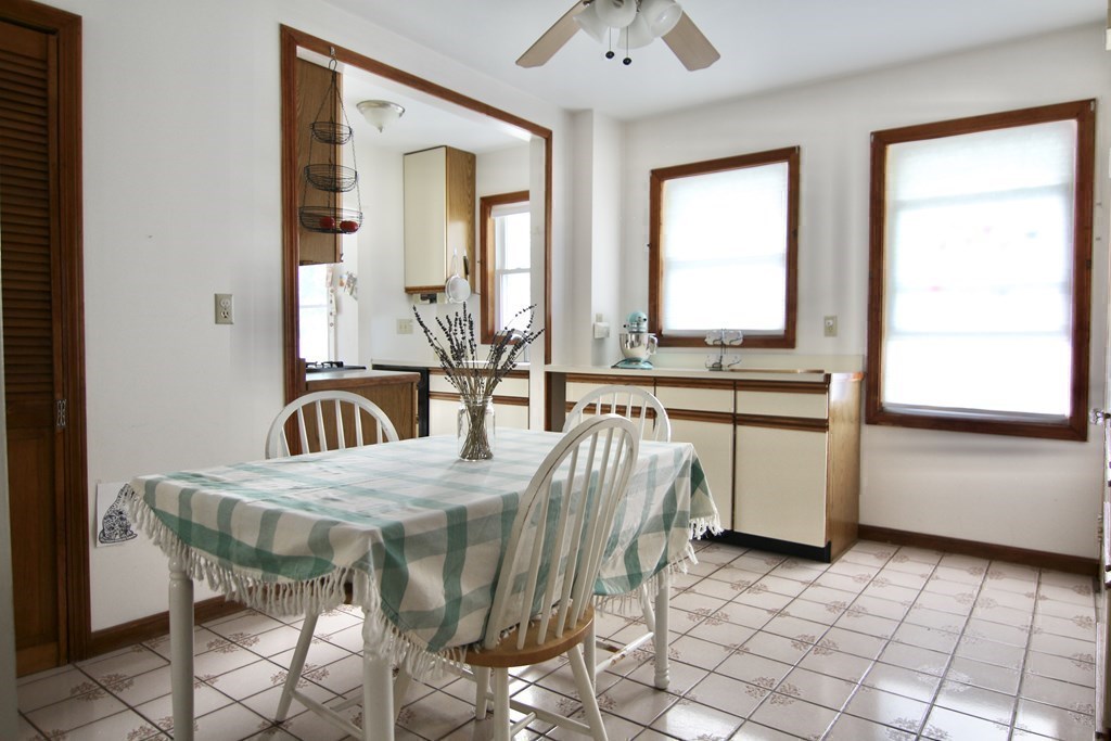48-50 Townsend Road Belmont, MA 02478 - Photo 14 of 25 a view of a dining room with furniture and window