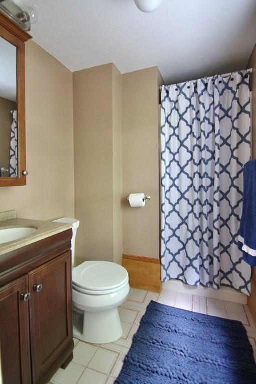 48-50 Townsend Road Belmont, MA 02478 - Photo 19 of 25 a bathroom with a sink and a toilet