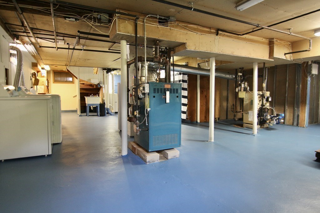 48-50 Townsend Road Belmont, MA 02478 - Photo 21 of 25 a view of a room with gym equipment