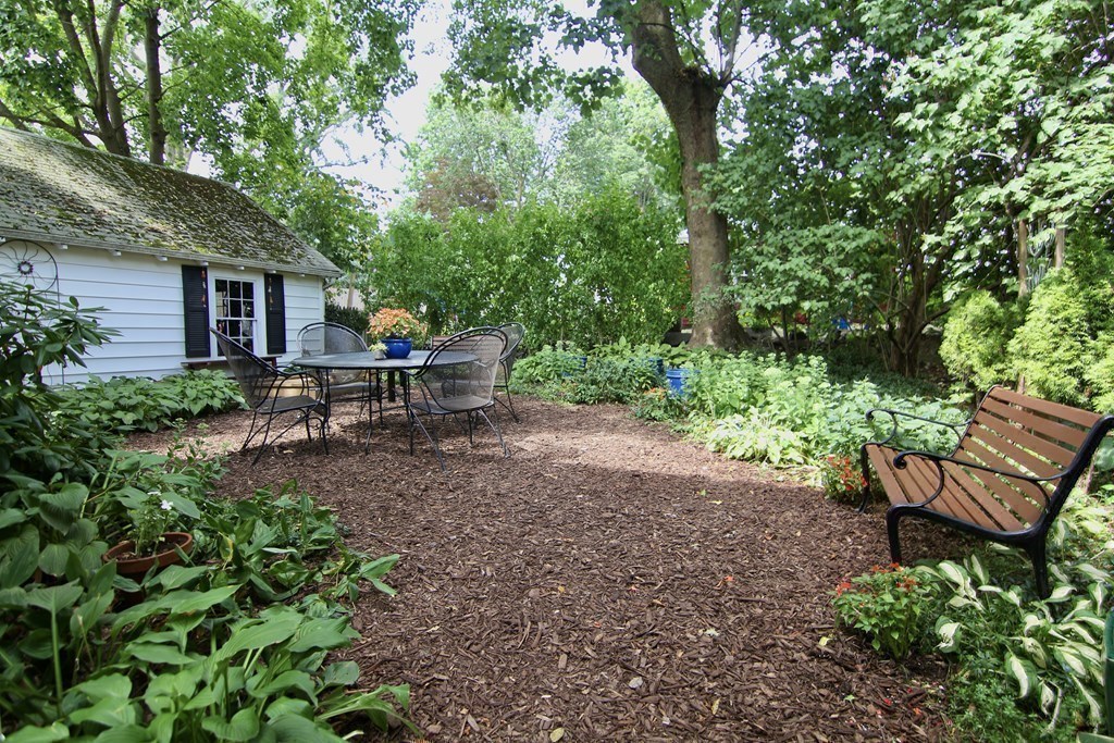 48-50 Townsend Road Belmont, MA 02478 - Photo 24 of 25 a view of a backyard with sitting area