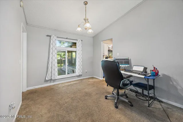 a workspace with chandelier