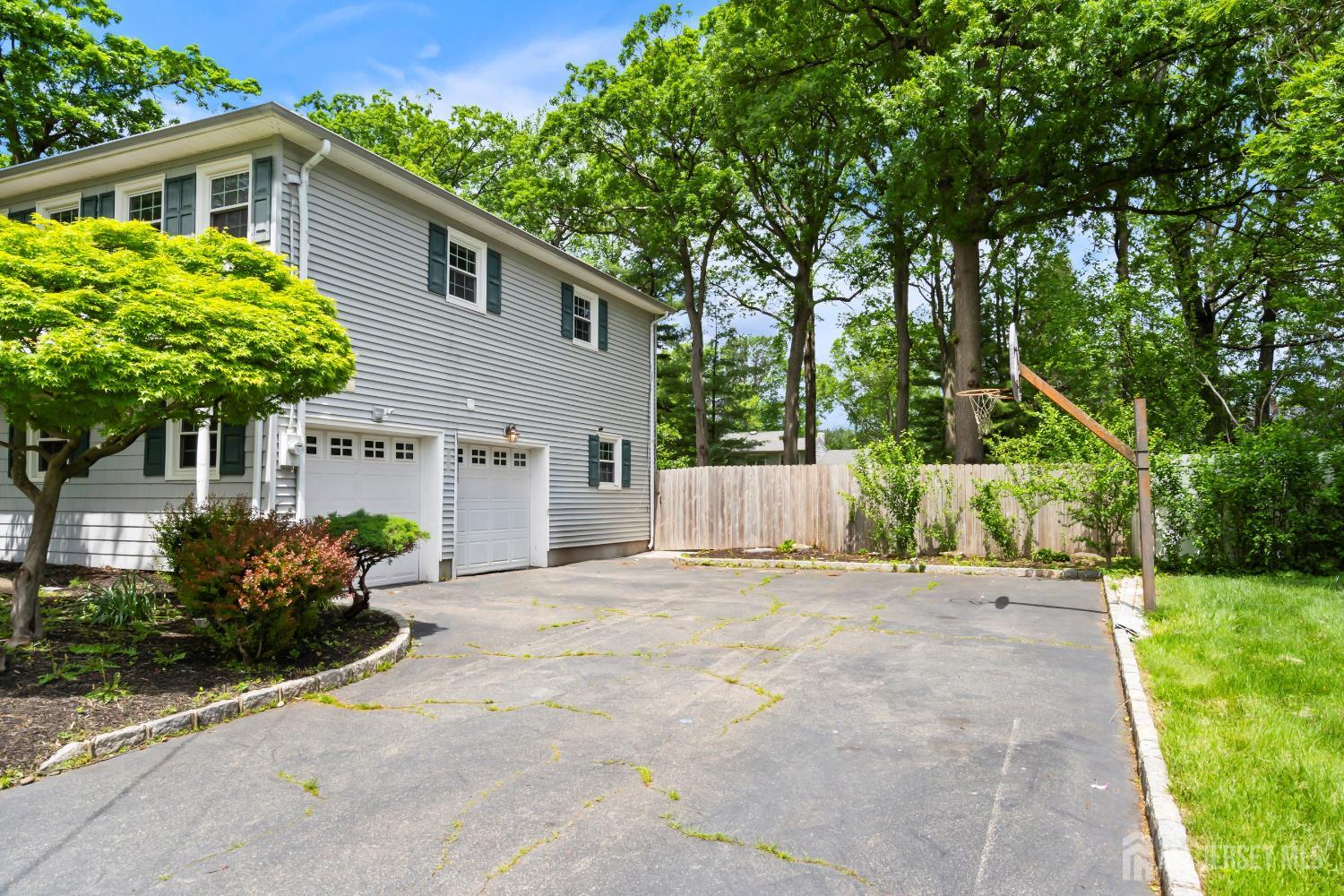 10 Woodruff Road Edison, NJ 08820 - Photo 2 of 18 a house view with a garden space