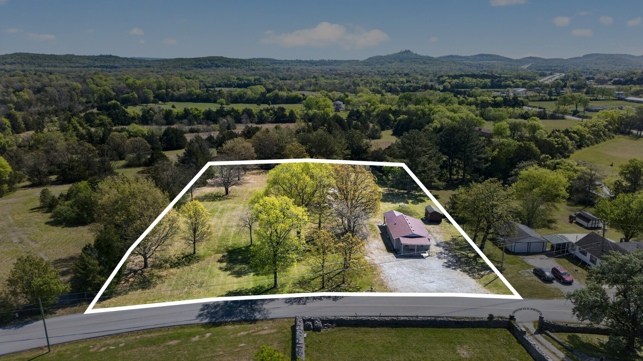 186 Baxter Road Murfreesboro, TN 37130 - Photo 39 of 39 a view of a small pool and trees in the background