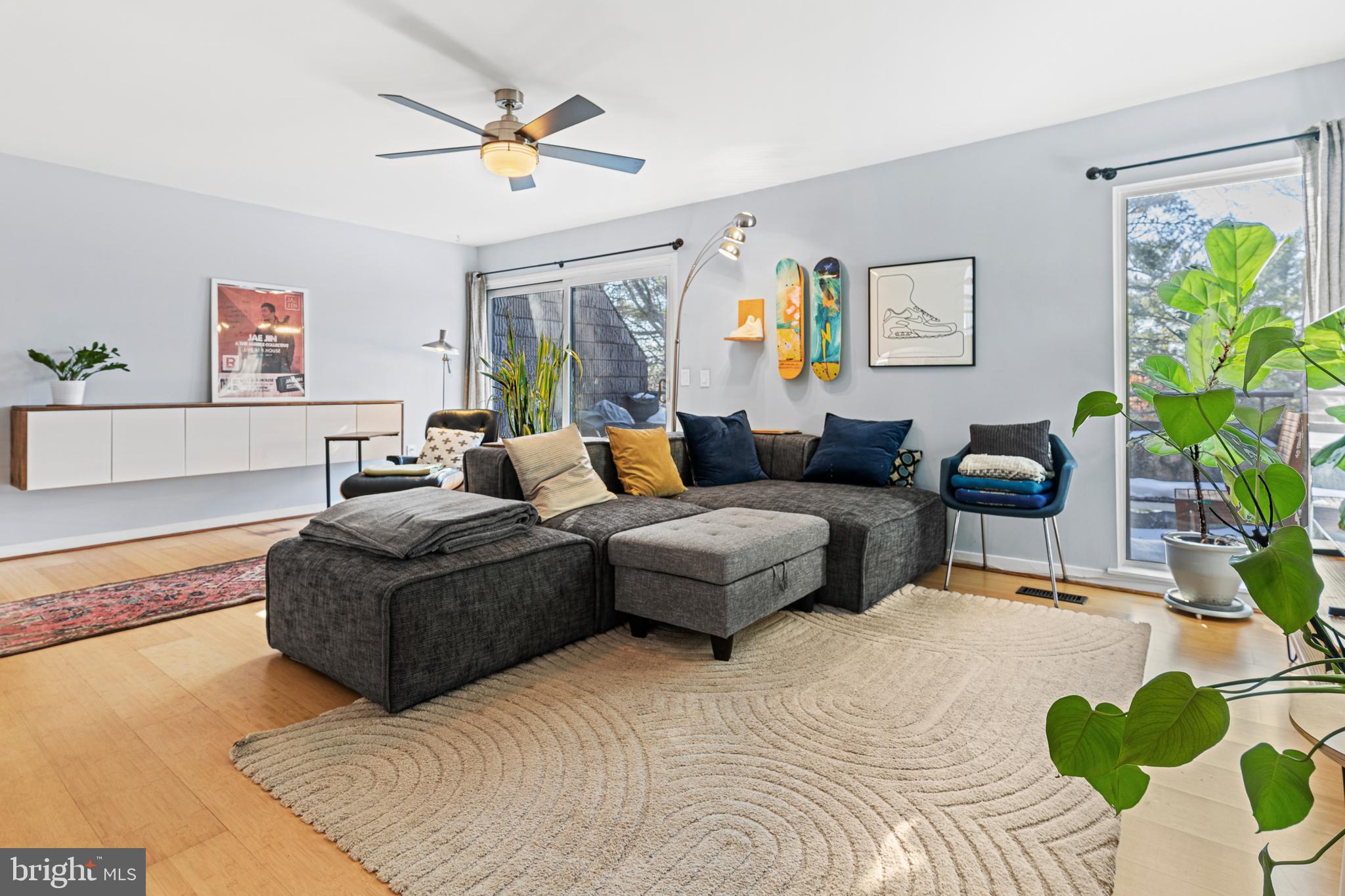 2361 Sundew Terrace, Unit 2361 Baltimore, MD 21209 - Photo 12 of 25 a living room with furniture and a potted plant