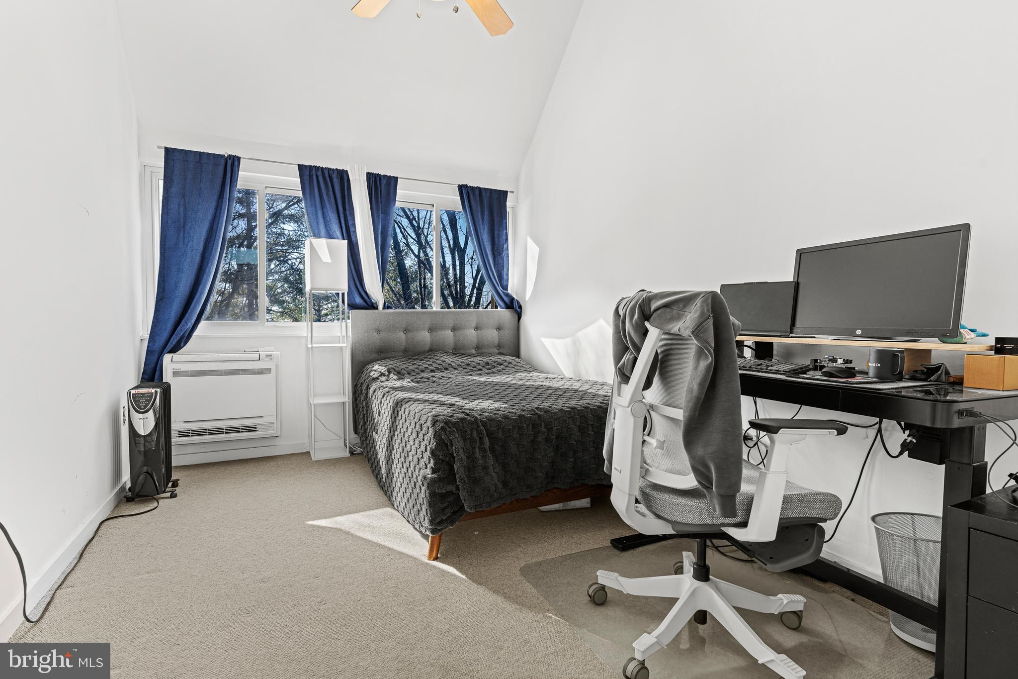 2361 Sundew Terrace, Unit 2361 Baltimore, MD 21209 - Photo 18 of 25 a bedroom with furniture and a window