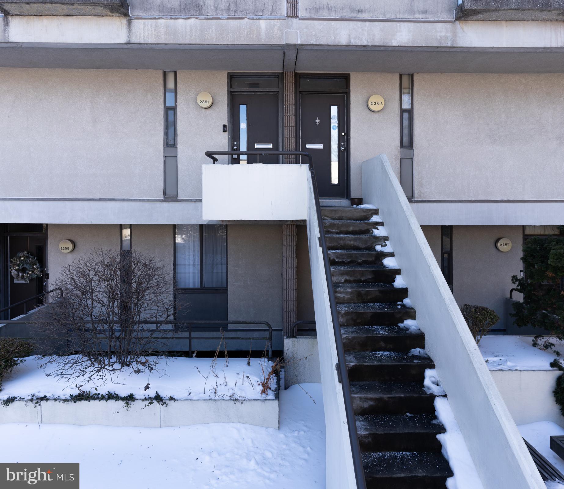 2361 Sundew Terrace, Unit 2361 Baltimore, MD 21209 - Photo 24 of 25 a view of a big room with wooden floor and lots of frames on wall