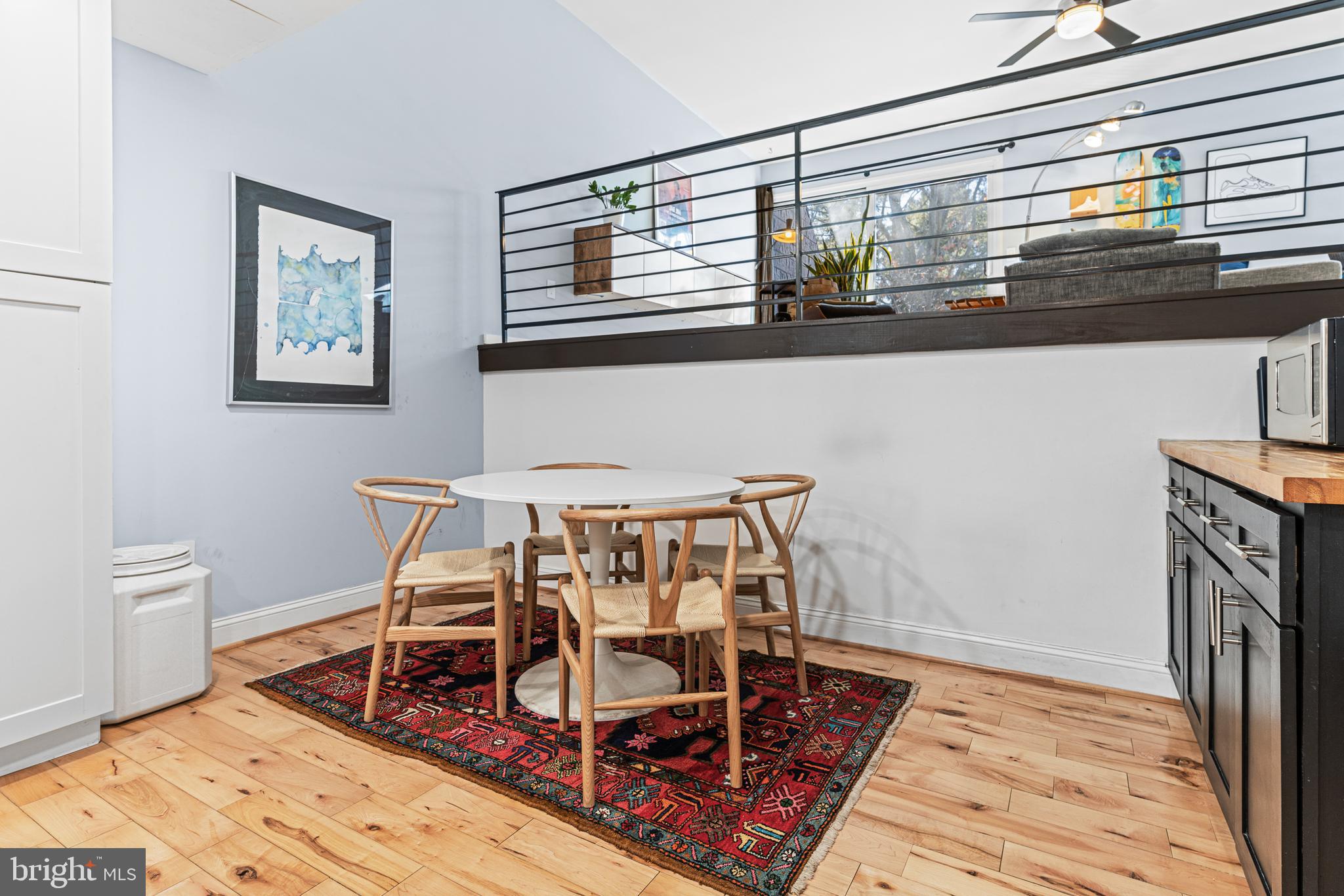 2361 Sundew Terrace, Unit 2361 Baltimore, MD 21209 - Photo 9 of 25 a view of a dining room with furniture and wooden floor