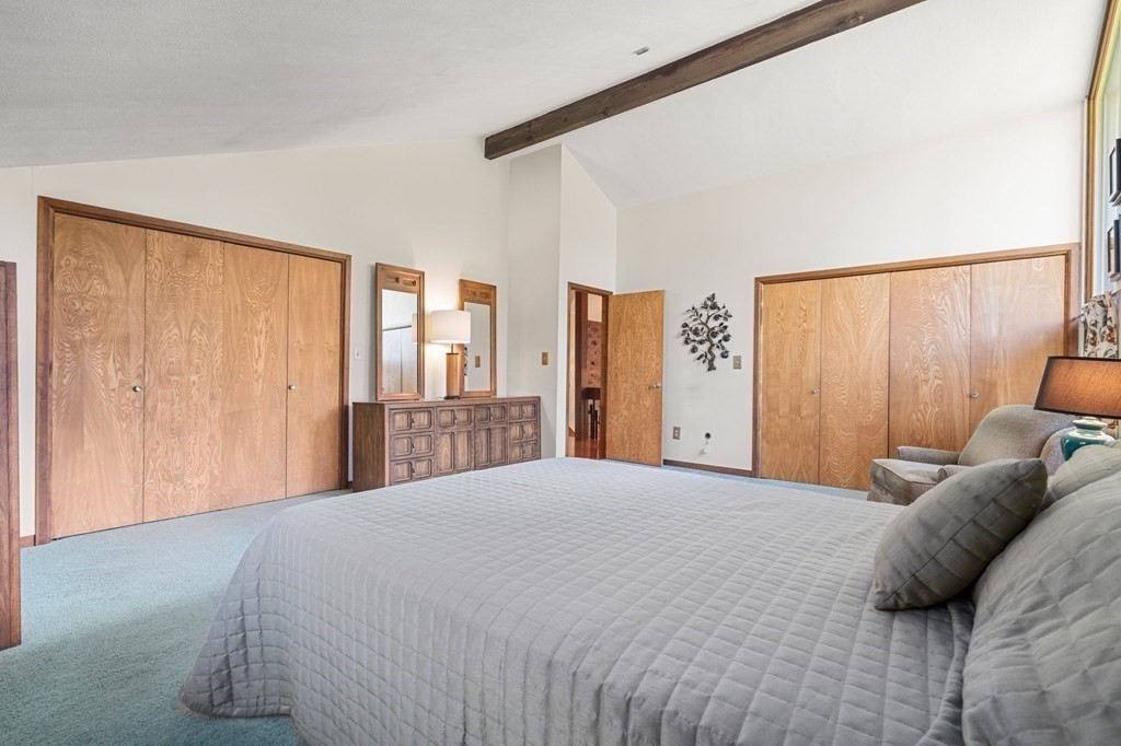 22 Maple Avenue Boxford, MA 01921 - Photo 18 of 42 a bedroom with a large bed and a large window