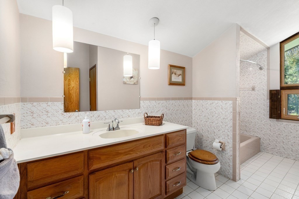 22 Maple Avenue Boxford, MA 01921 - Photo 21 of 42 a bathroom with a sink and a mirror