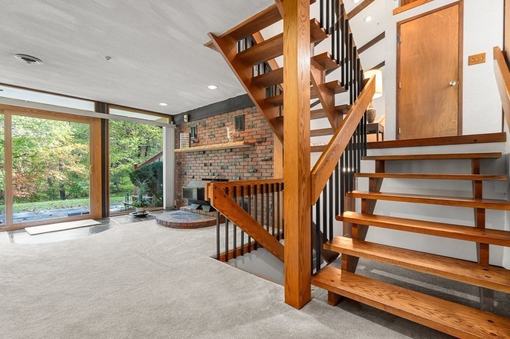 22 Maple Avenue Boxford, MA 01921 - Photo 22 of 42 a view of entryway with wooden floor and stairs