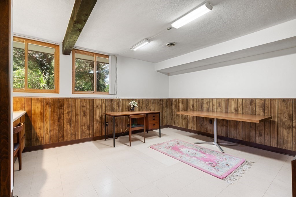 22 Maple Avenue Boxford, MA 01921 - Photo 27 of 42 a living room with furniture a rug and white walls