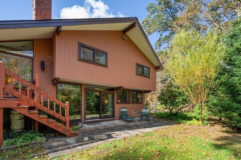 22 Maple Avenue Boxford, MA 01921 - Photo 36 of 42 a view of a house with a yard balcony and furniture