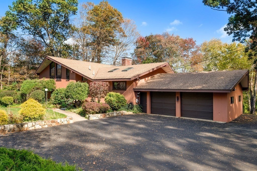 22 Maple Avenue Boxford, MA 01921 - Photo 42 of 42 a view of a house with a yard and potted plants