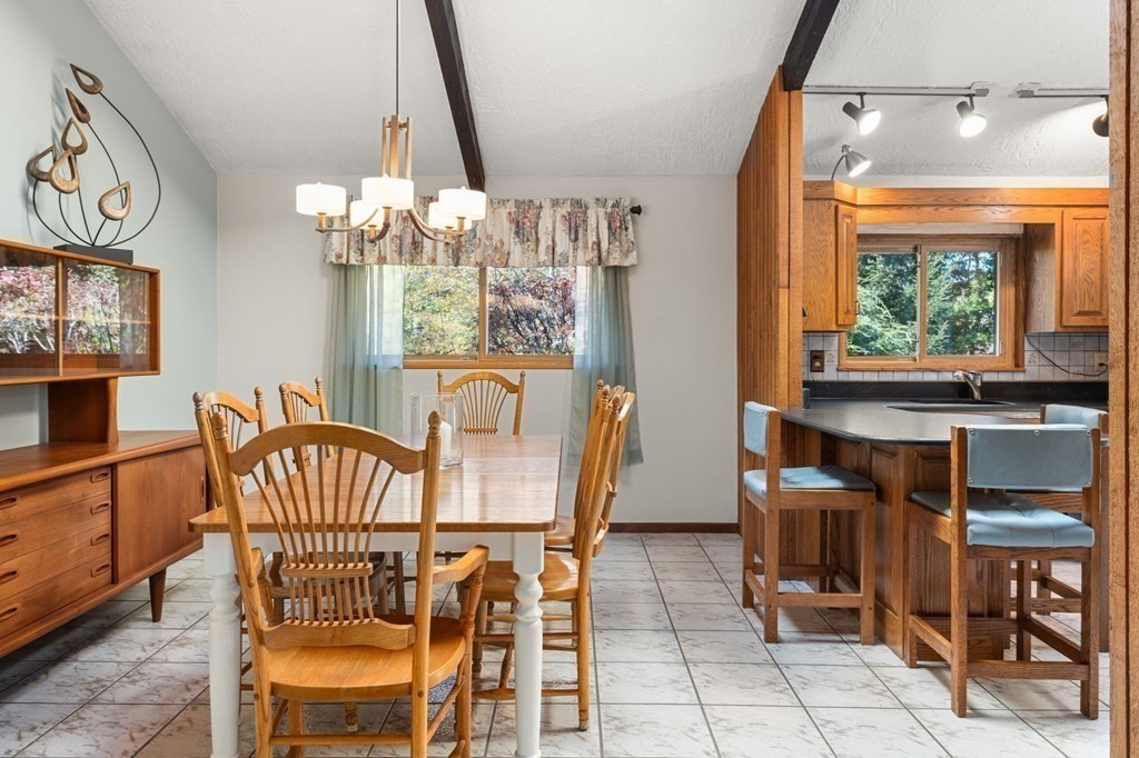 22 Maple Avenue Boxford, MA 01921 - Photo 7 of 42 a view of a dining room with furniture and chandelier