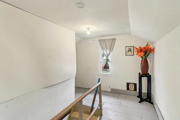 a view of a hallway with entryway