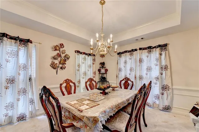 a kitchen with stainless steel appliances a sink stove and refrigerator