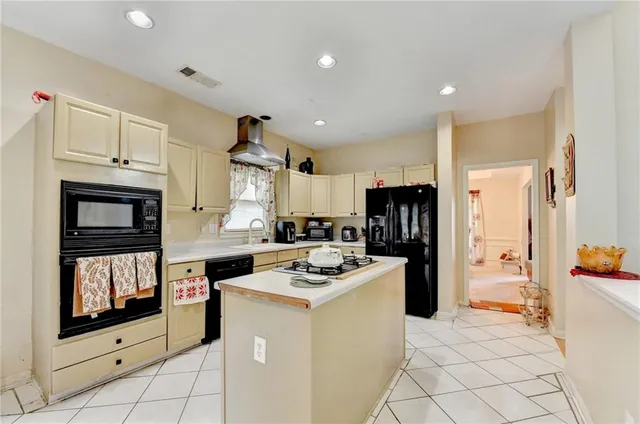 a living room with furniture fireplace and sink
