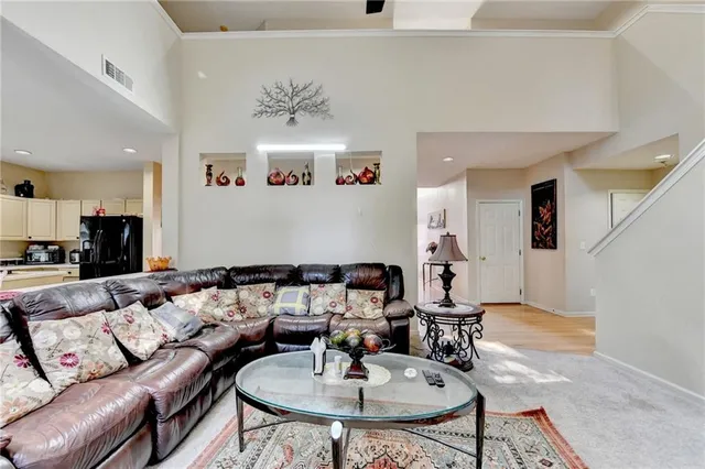 a bed room with a bed and a dresser