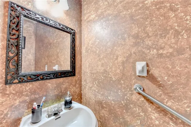 a bathroom with a tub and a shower