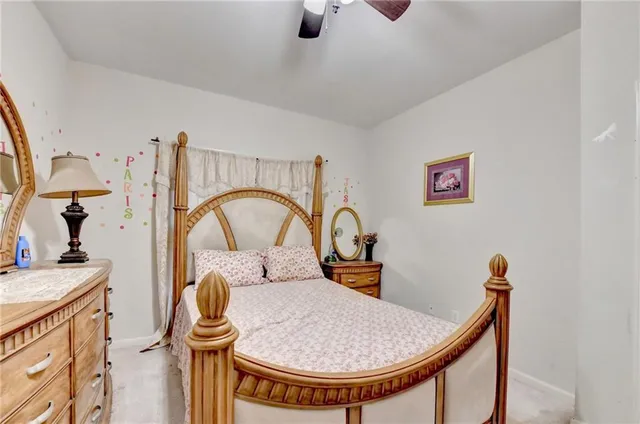 a bathroom with a tub sink and a mirror