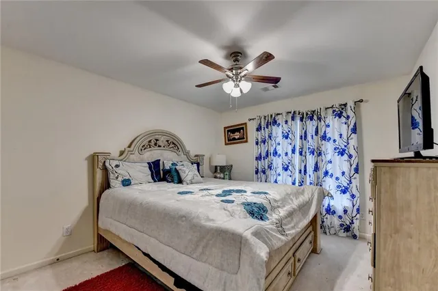 an aerial view of a house with outdoor space and street view