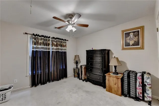 an aerial view of a house with a garden