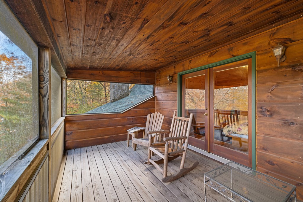 254 Aries Lane Blue Ridge, GA 30513 - Photo 26 of 43 a view of chairs in wooden deck