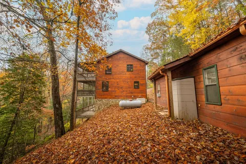 a view of a backyard of the house