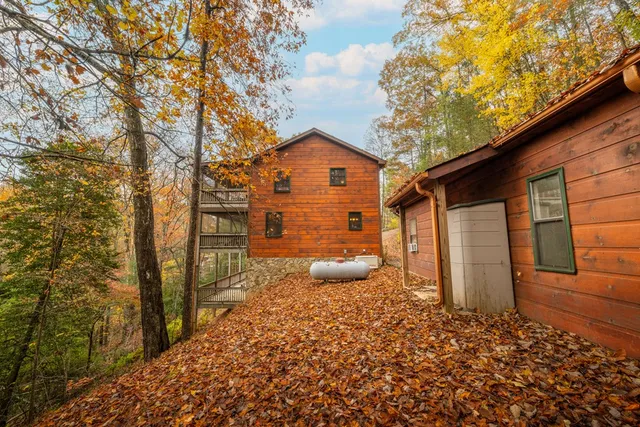 a view of a backyard of the house