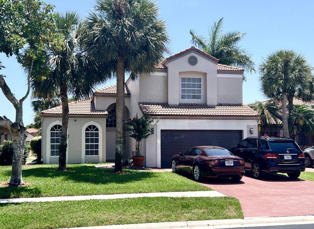 7271 Via Palomar Boca Raton, FL 33433 - Photo 1 of 24 House front