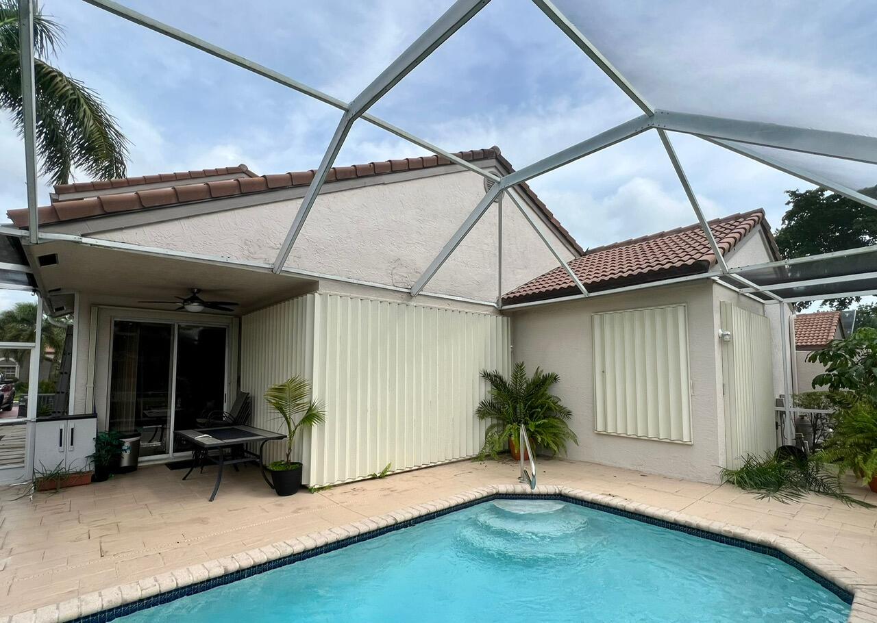 7271 Via Palomar Boca Raton, FL 33433 - Photo 21 of 24 Accordion Hurricane shutters