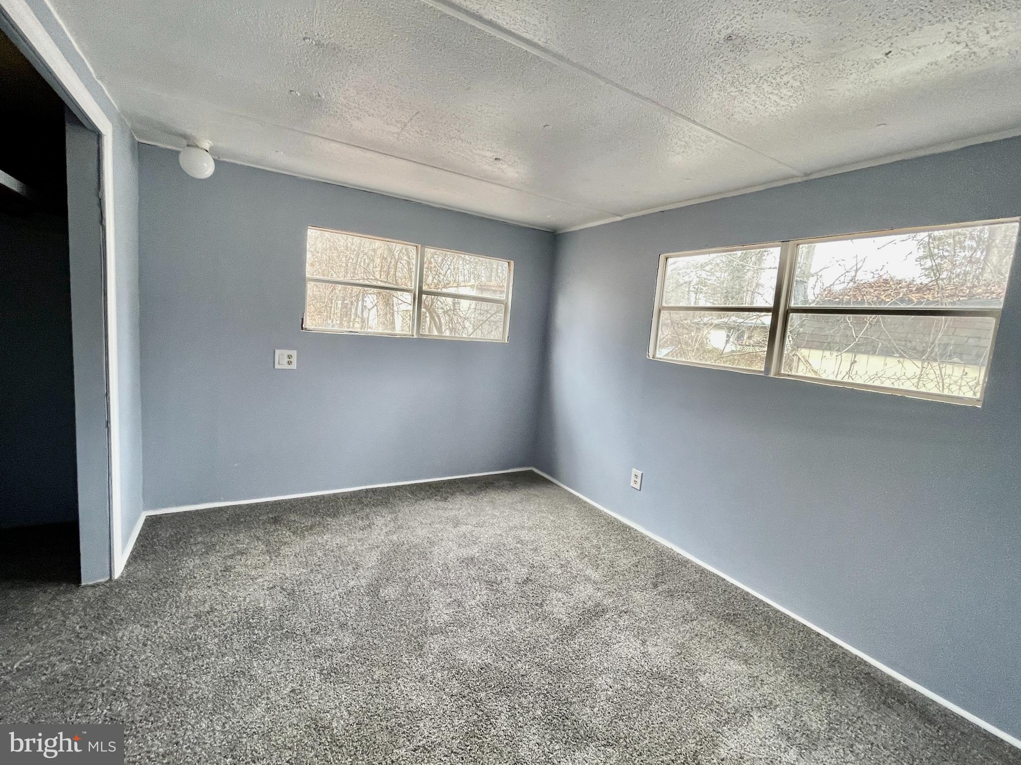 541 Fern Road Millville, NJ 08332 - Photo 11 of 15 an empty room with windows