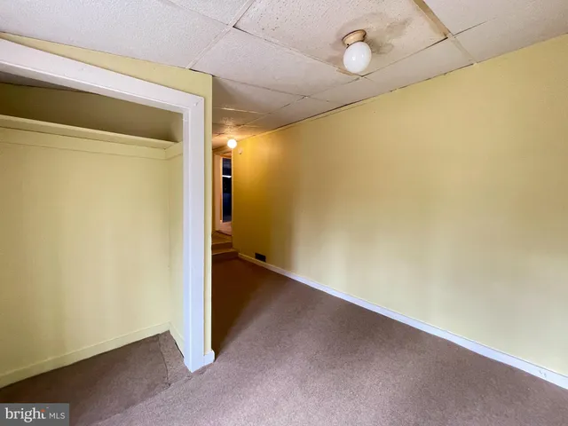 a view of a room with large windows