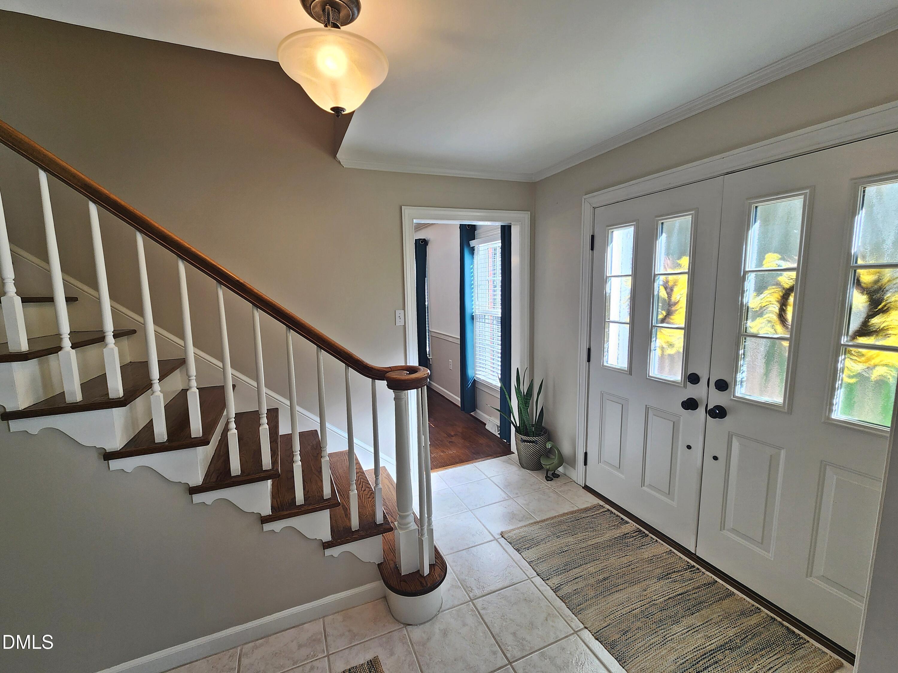 4704 Oak Park Road Raleigh, NC 27612 - Photo 14 of 62 a view of a hallway with windows
