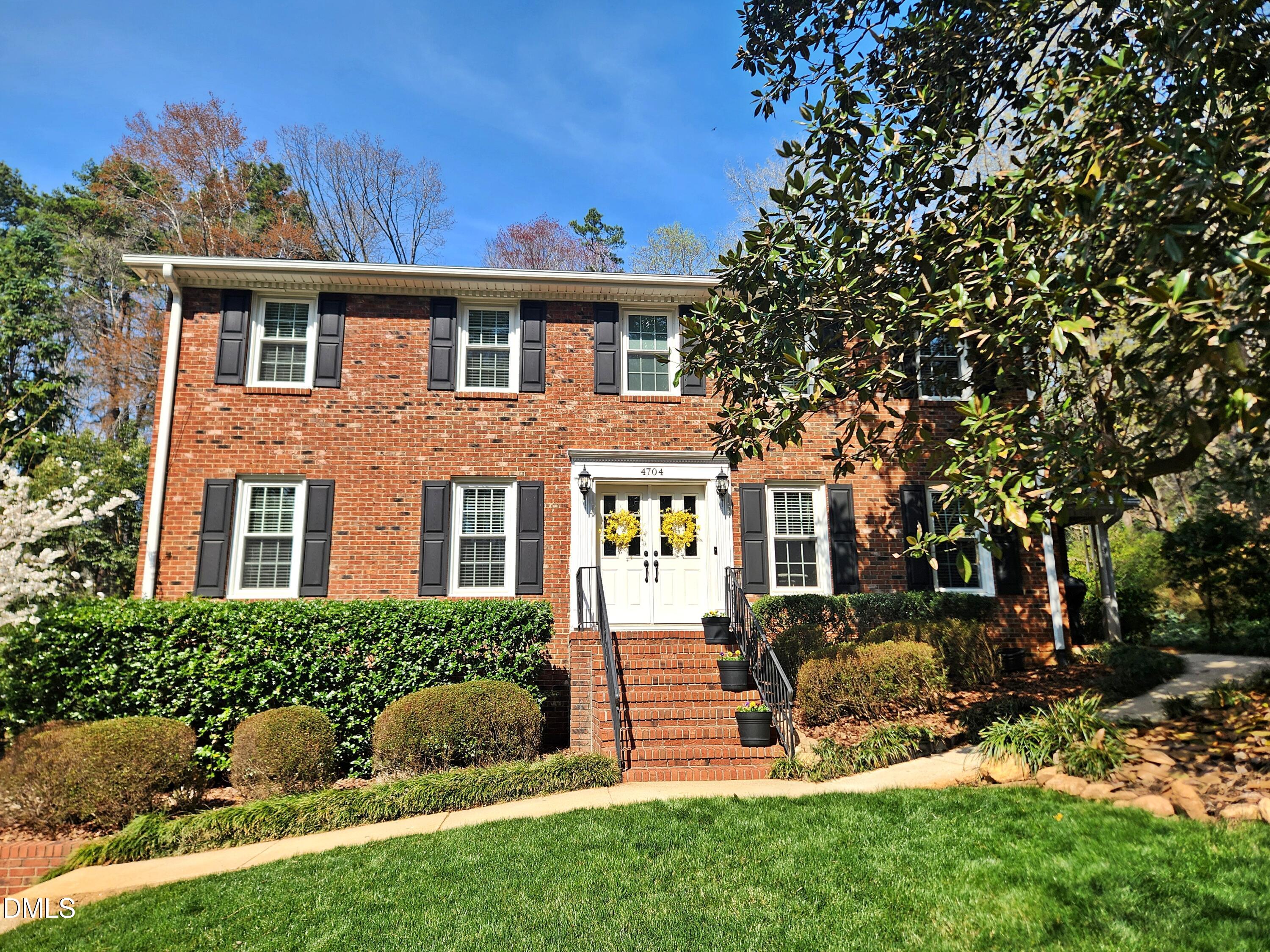 4704 Oak Park Road Raleigh, NC 27612 - Photo 2 of 62 a front view of a house with a yard