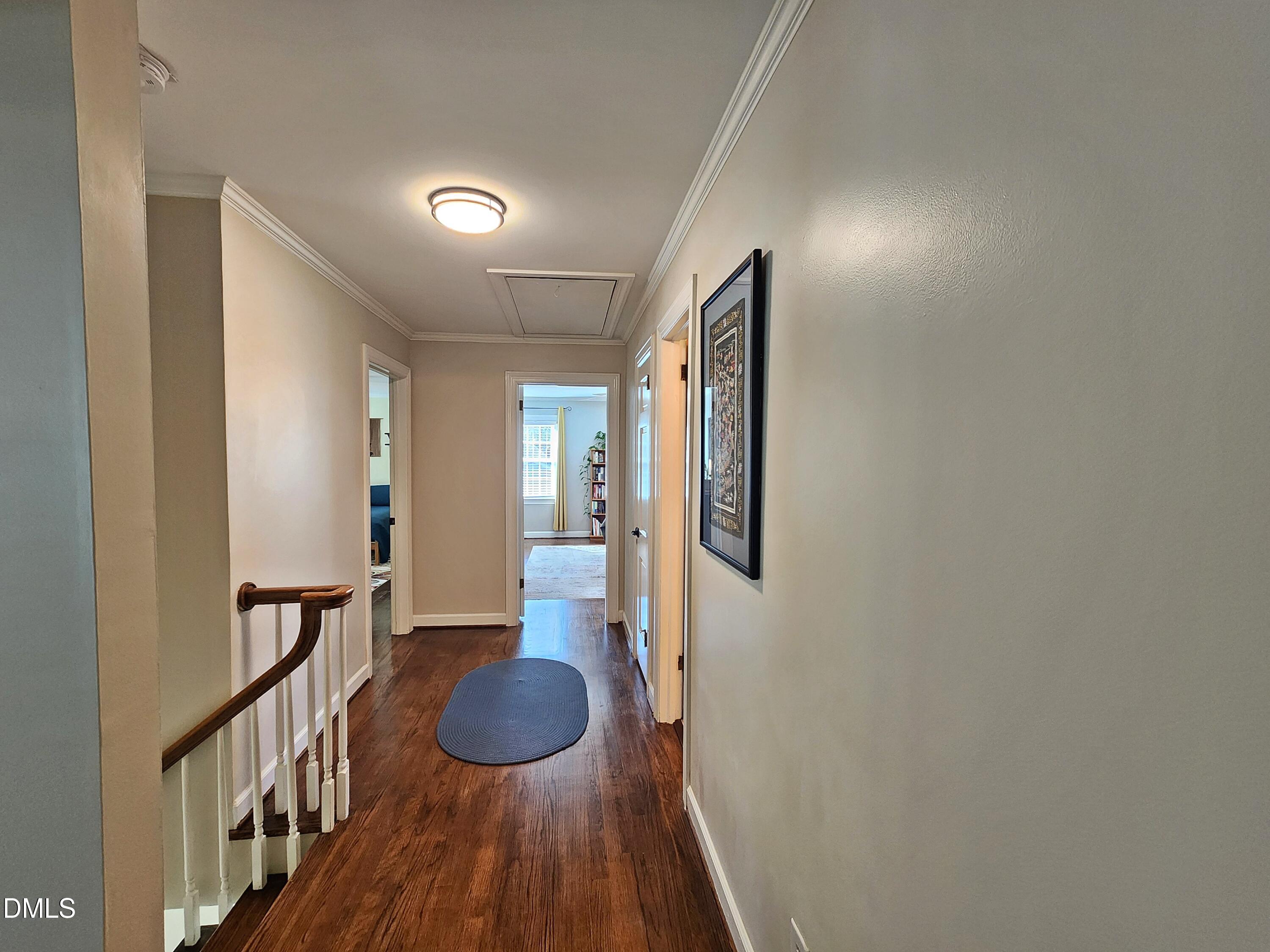 4704 Oak Park Road Raleigh, NC 27612 - Photo 35 of 62 a bathroom with a sink and a mirror