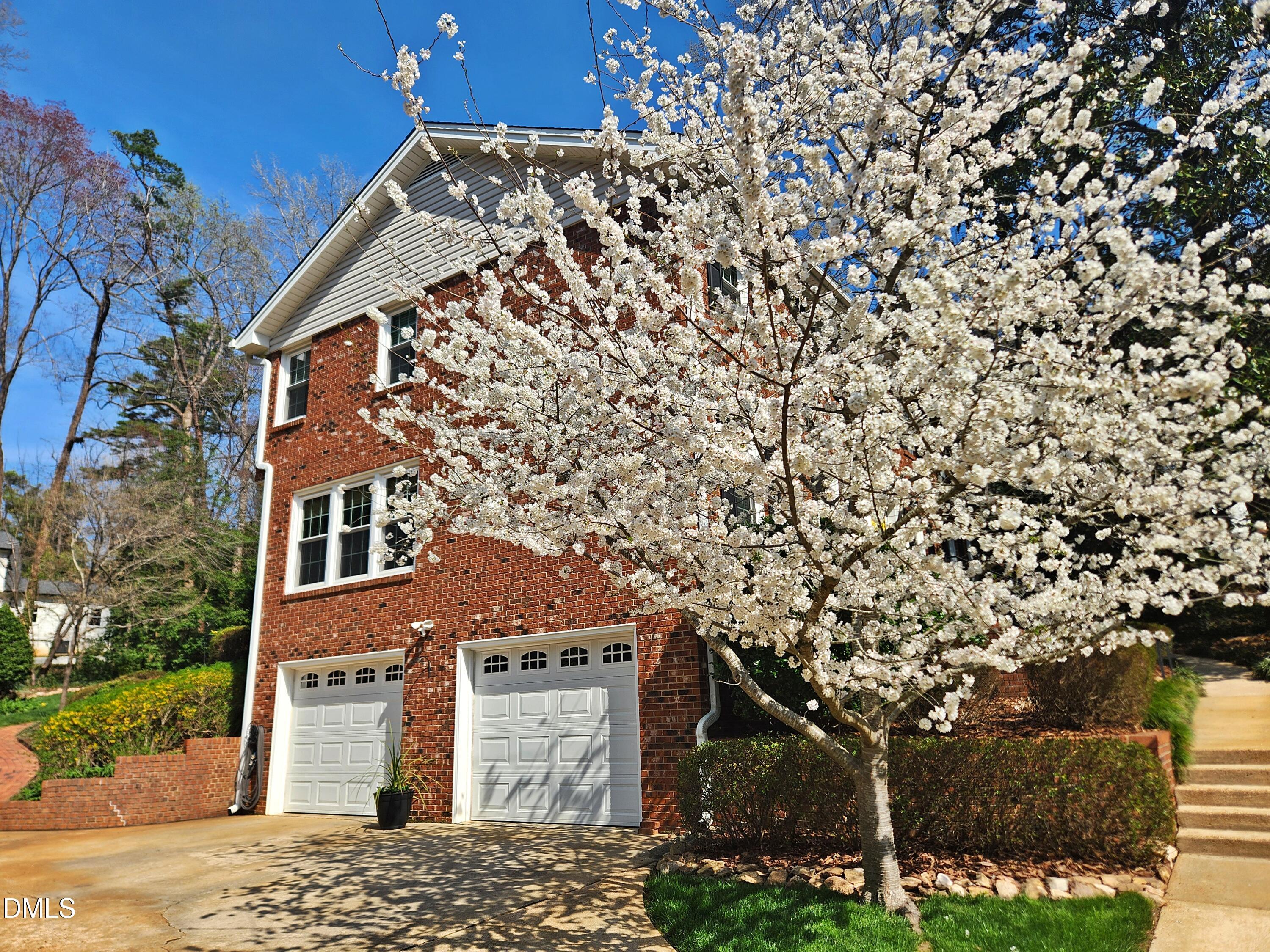 4704 Oak Park Road Raleigh, NC 27612 - Photo 3 of 62 front view of a house with a trees