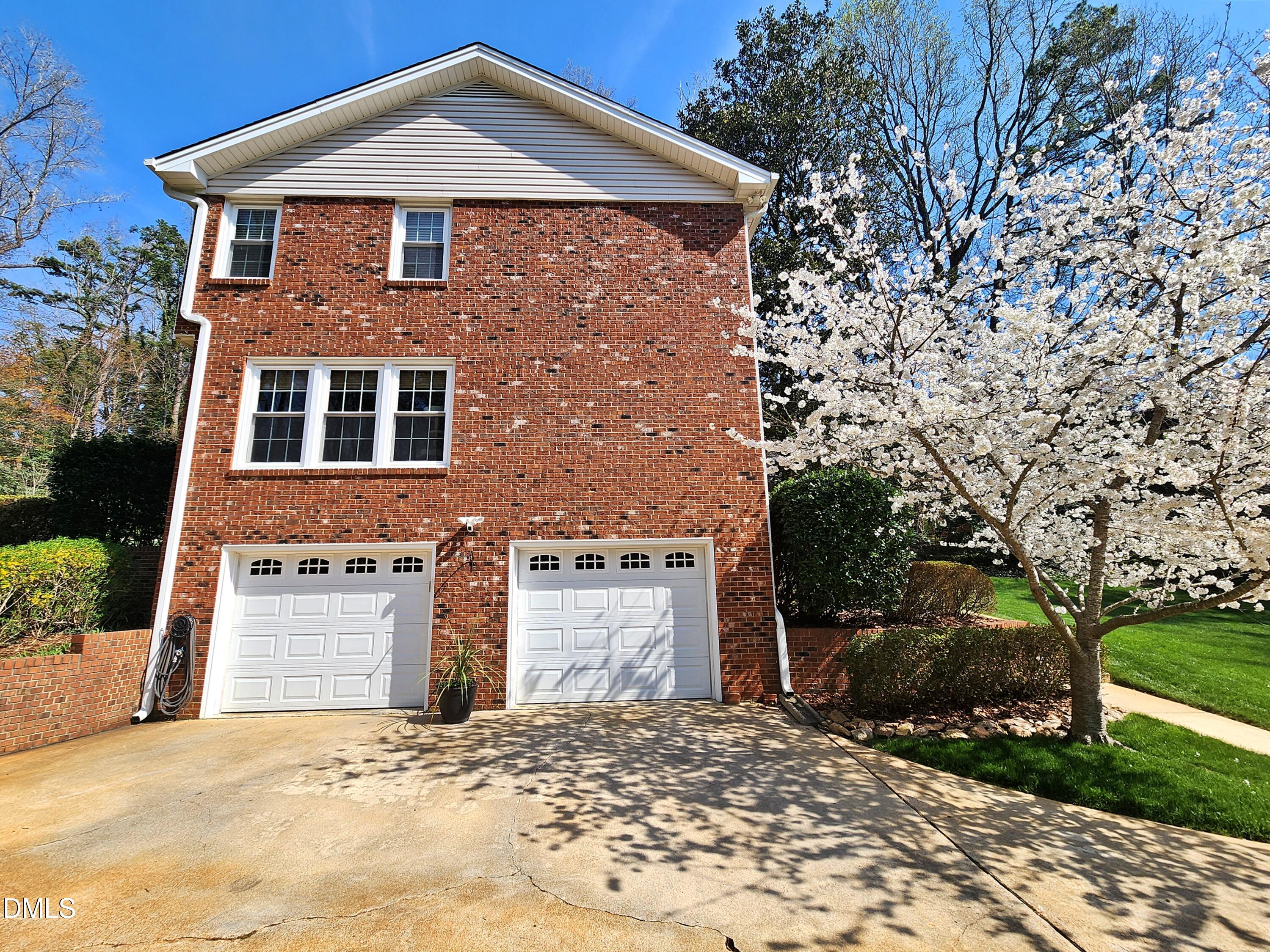 4704 Oak Park Road Raleigh, NC 27612 - Photo 4 of 62 a front view of a house with a yard