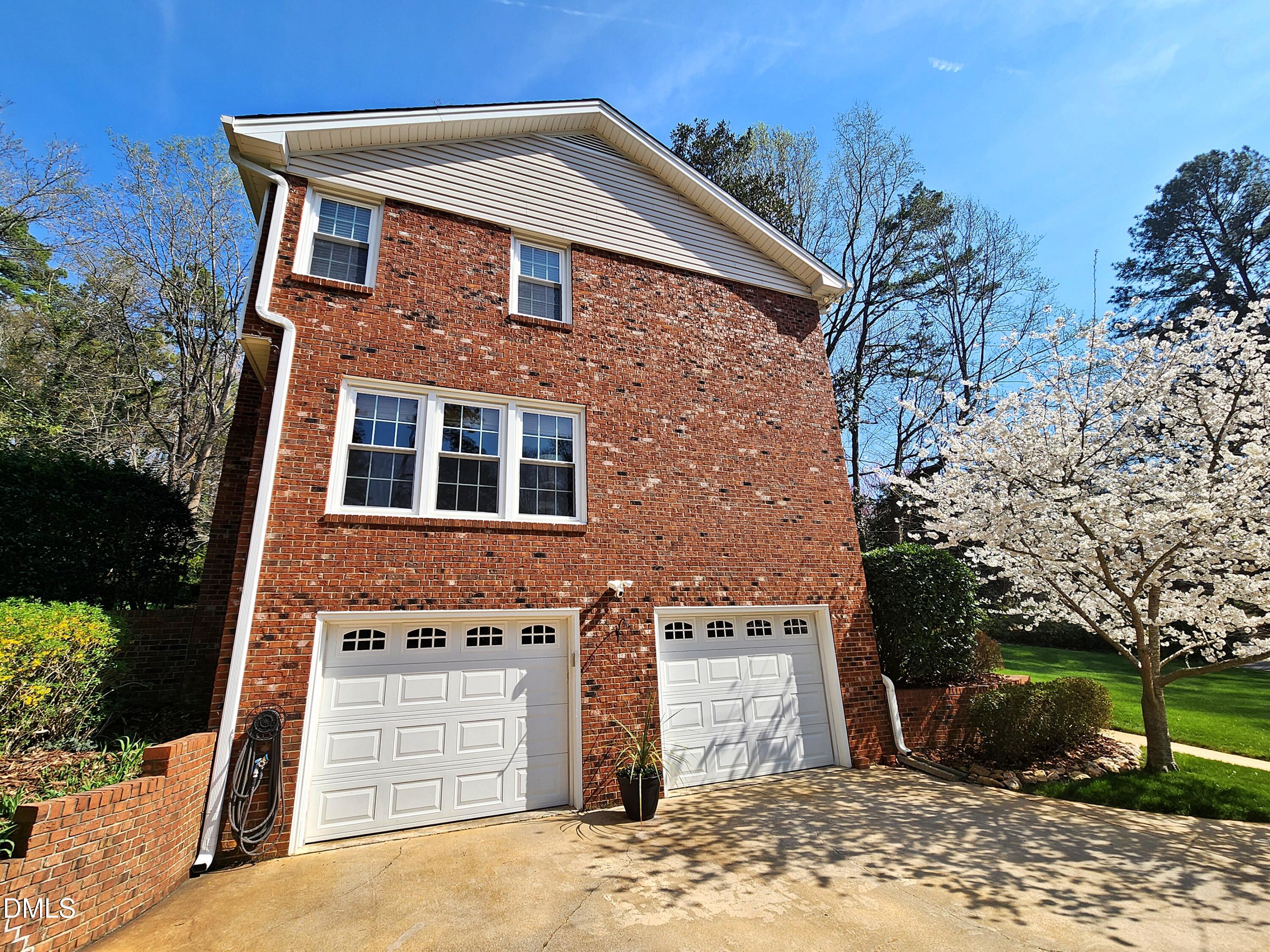 4704 Oak Park Road Raleigh, NC 27612 - Photo 58 of 62 a front view of a house with a yard