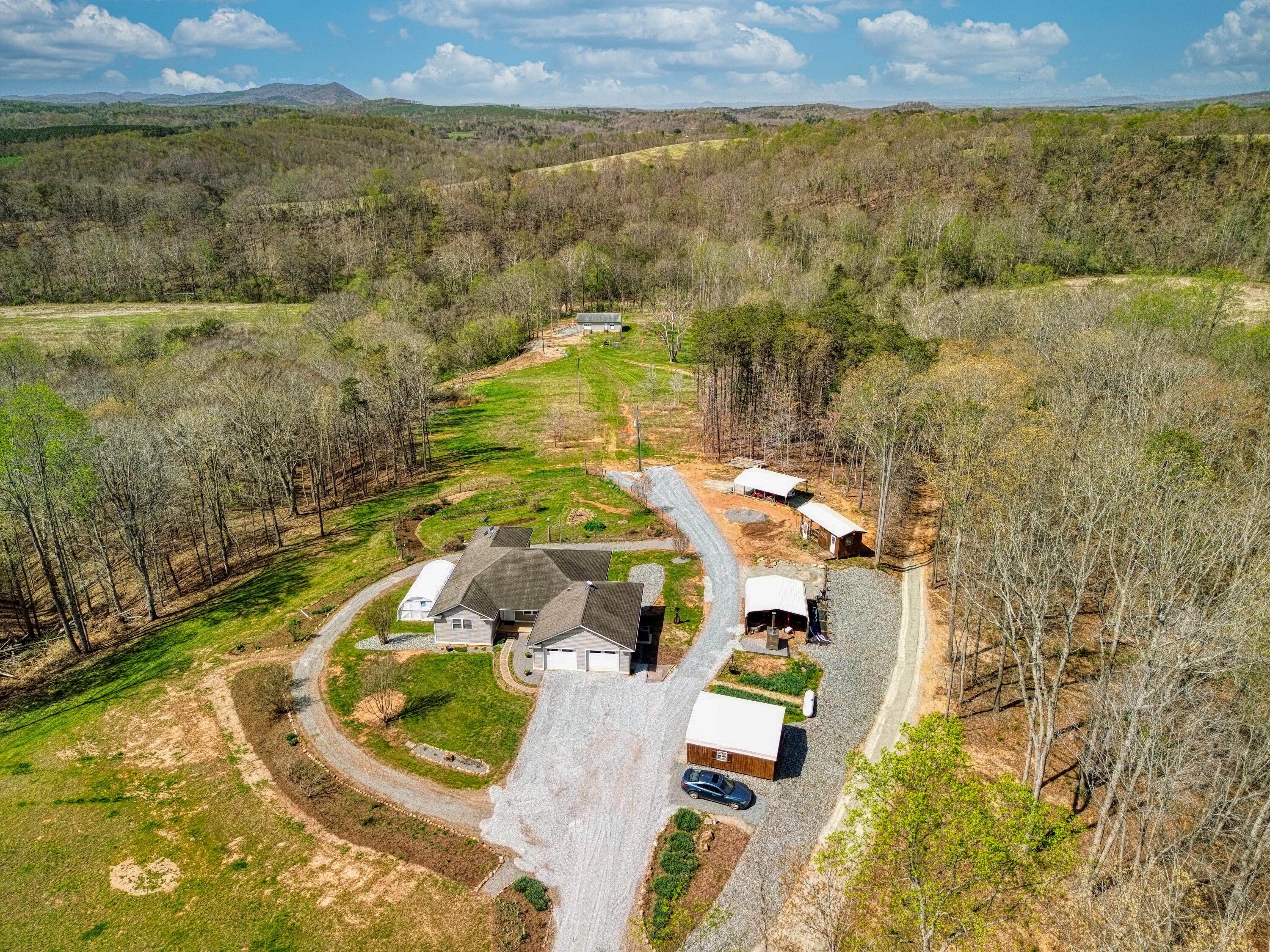 498 Meeks Road Penhook, VA 24137 - Photo 3 of 74 dji_fly_20260403_115258_473_177523165862