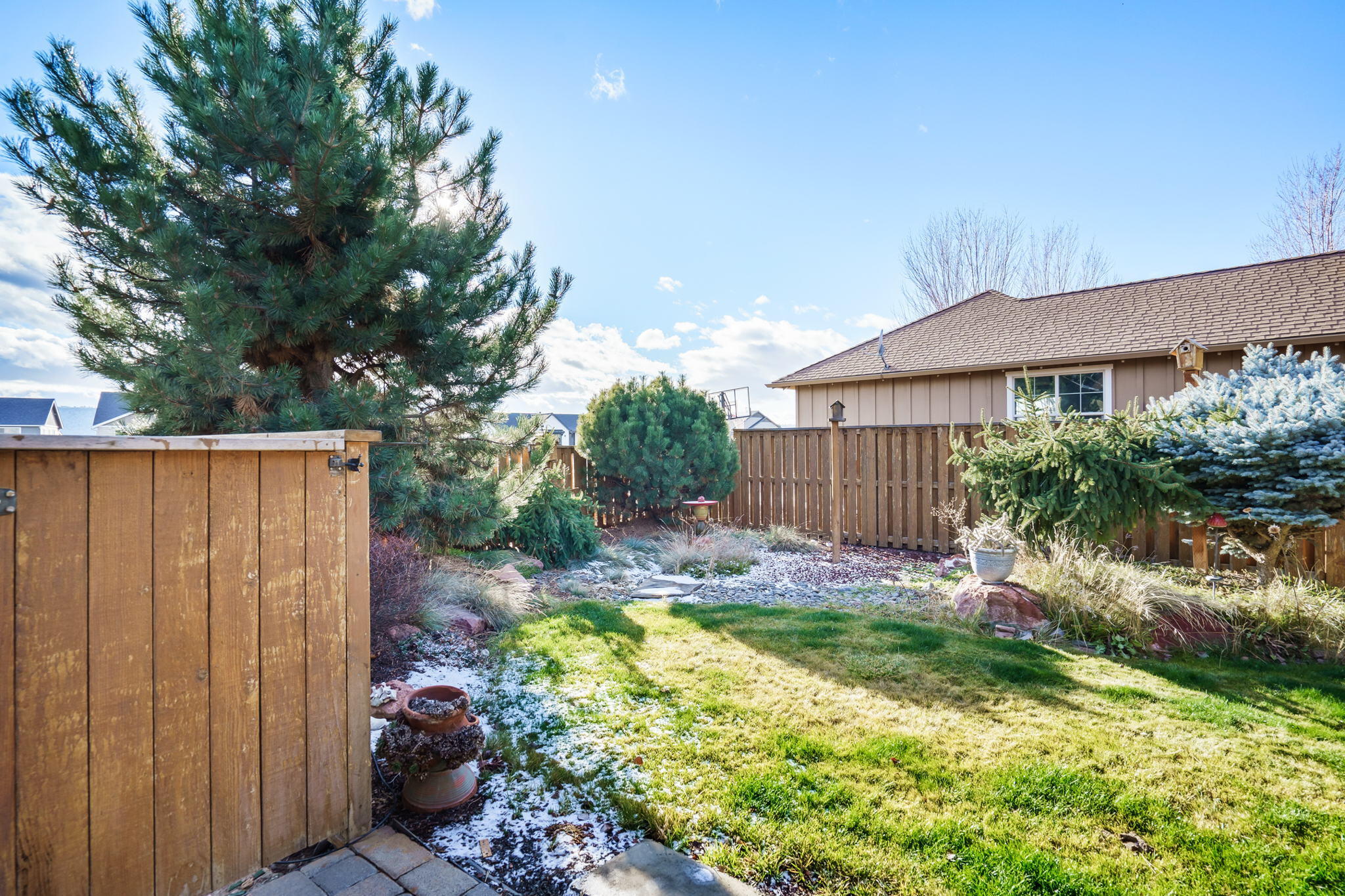 1408 Northeast Hudspeth Road Prineville, OR 97754 - Photo 9 of 26 Fenced landscaped yard