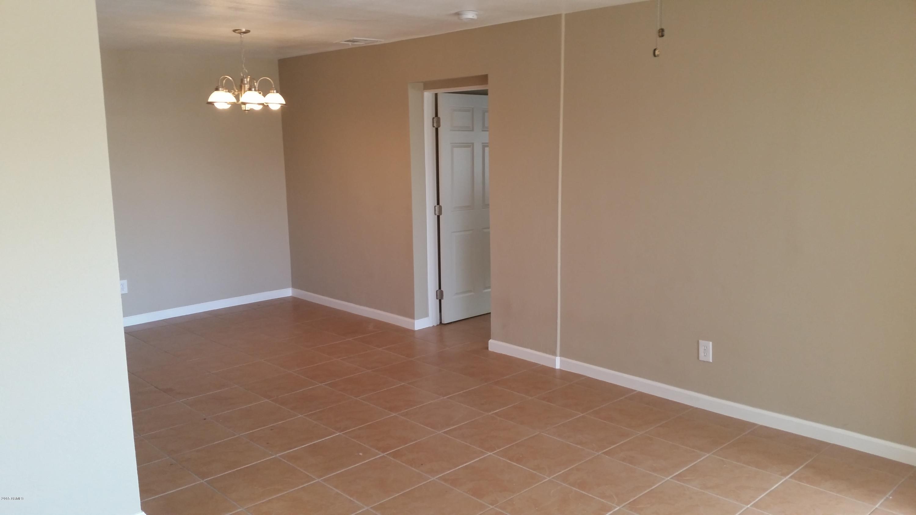 143 West Piedmont Road Phoenix, AZ 85041 - Photo 3 of 30 Living Room 2