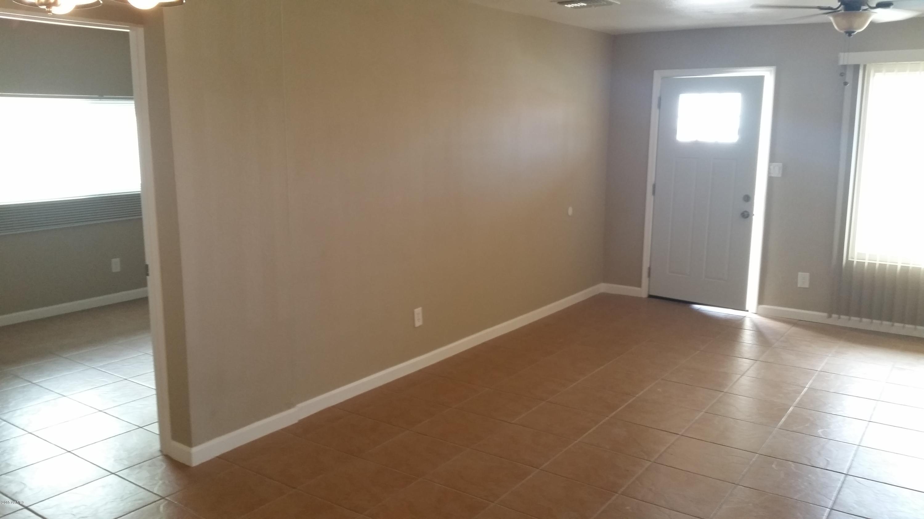 143 West Piedmont Road Phoenix, AZ 85041 - Photo 4 of 30 Living Room 3
