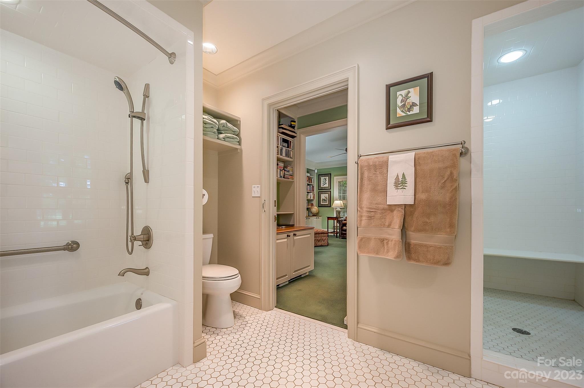 1389 Landrum Road Columbus, NC 28722 - Photo 13 of 46 a bathroom with a bathtub shower sink and toilet