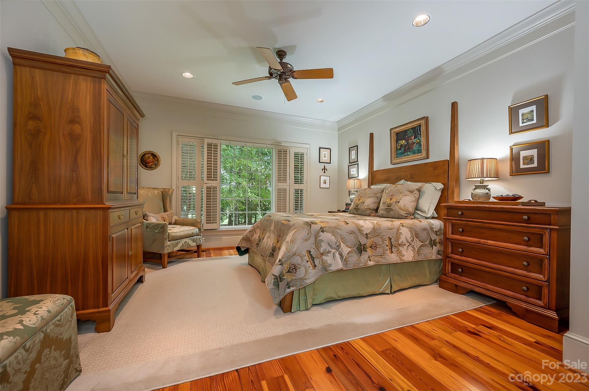 1389 Landrum Road Columbus, NC 28722 - Photo 14 of 46 a bedroom with a bed and wooden floor
