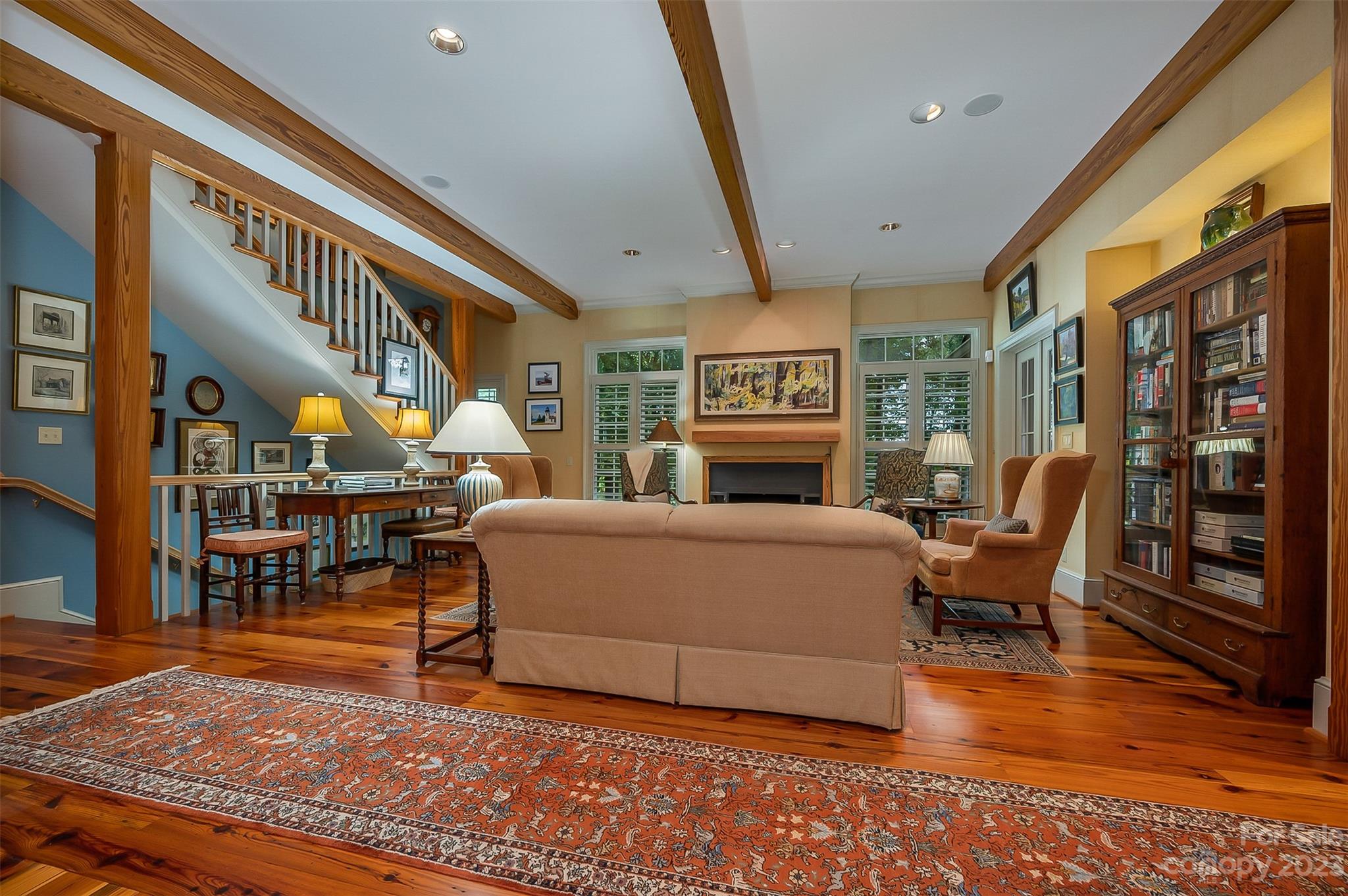 1389 Landrum Road Columbus, NC 28722 - Photo 19 of 46 a living room with furniture a rug and a large window