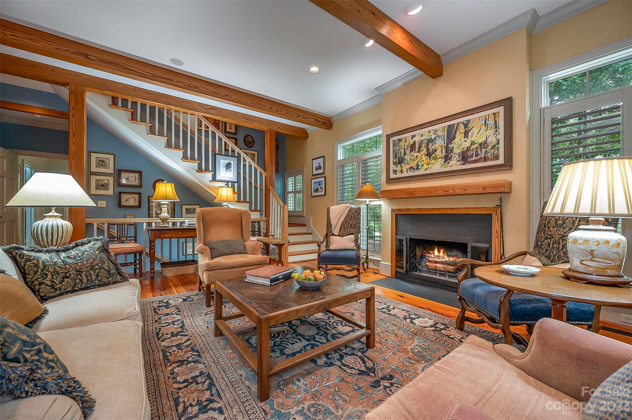 1389 Landrum Road Columbus, NC 28722 - Photo 20 of 46 a living room with furniture and a fireplace