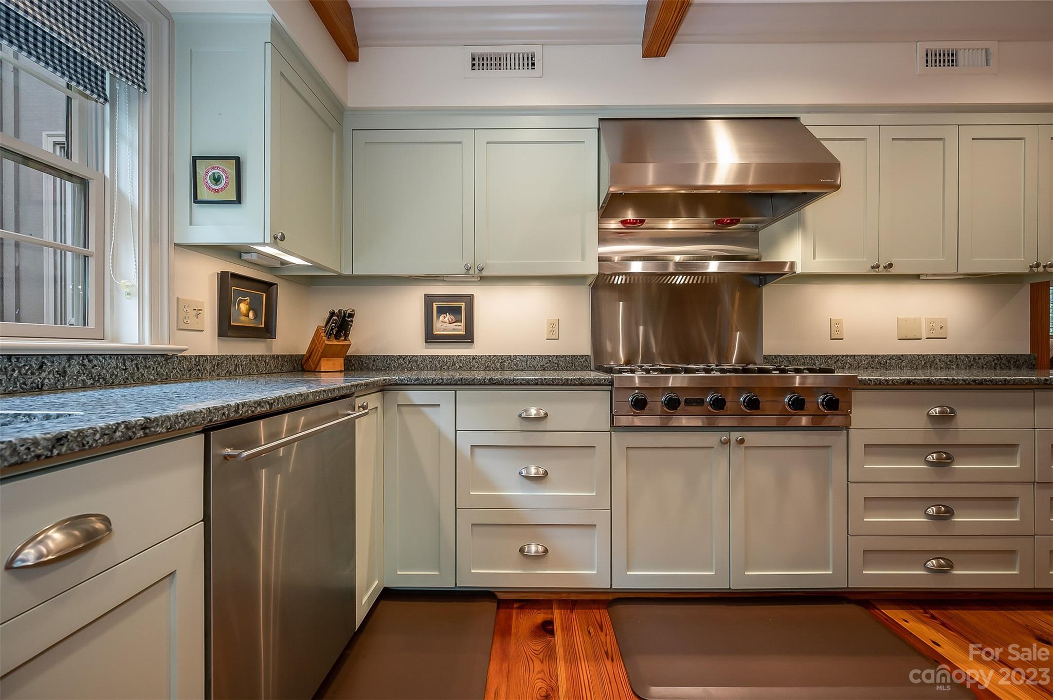 1389 Landrum Road Columbus, NC 28722 - Photo 26 of 46 a kitchen with a stove and a microwave