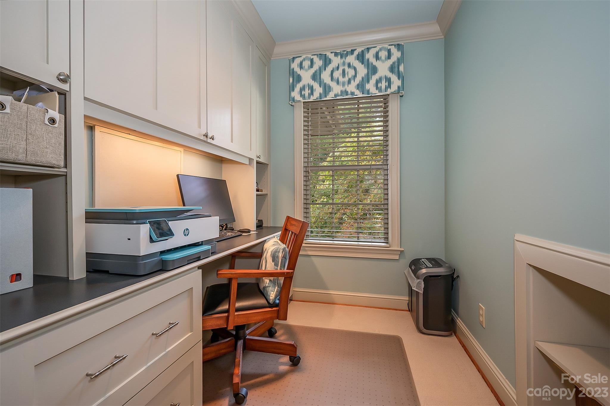 1389 Landrum Road Columbus, NC 28722 - Photo 38 of 46 a view of a workspace with furniture and a window
