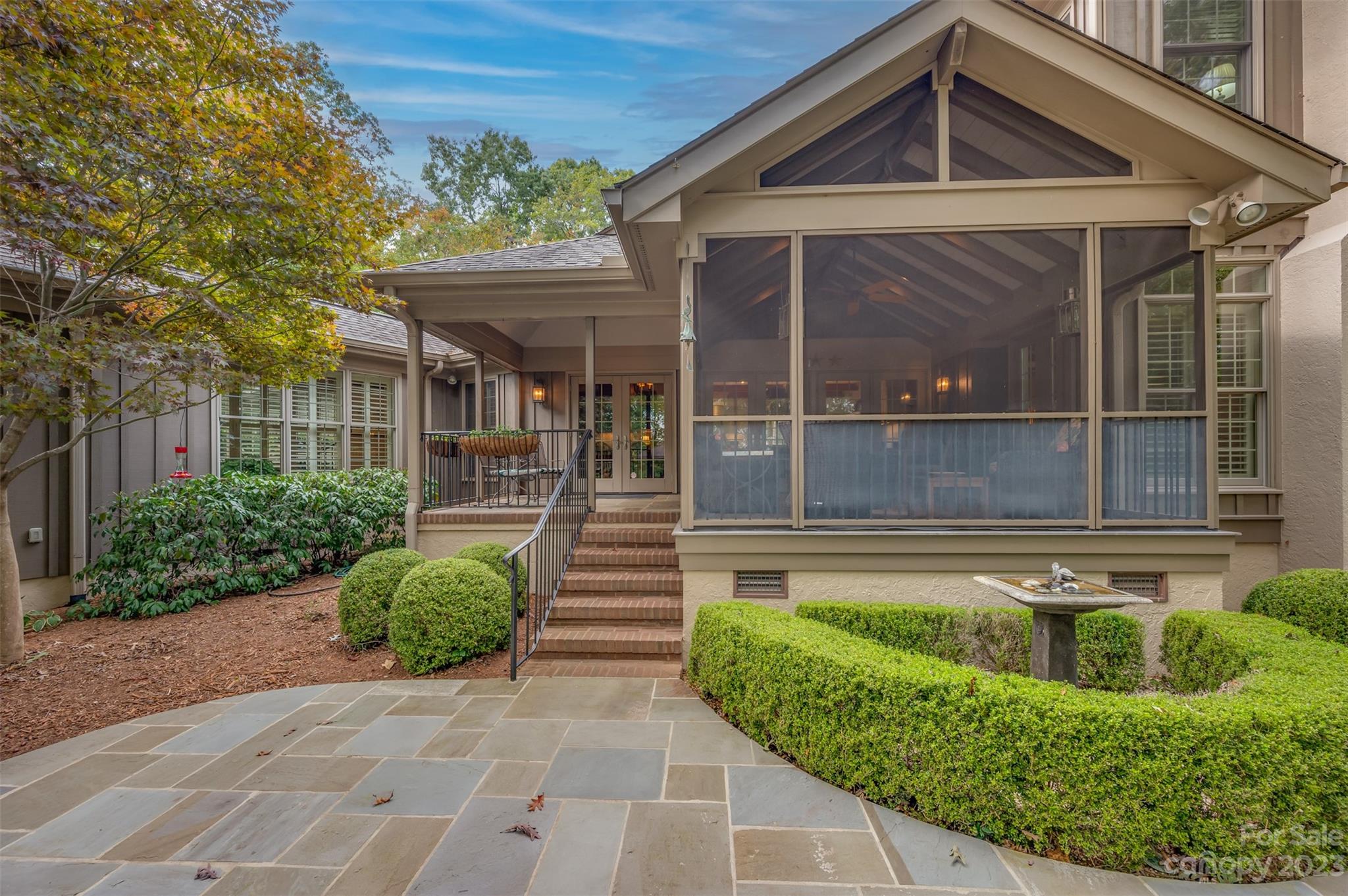 1389 Landrum Road Columbus, NC 28722 - Photo 6 of 46 a front view of a house with garden